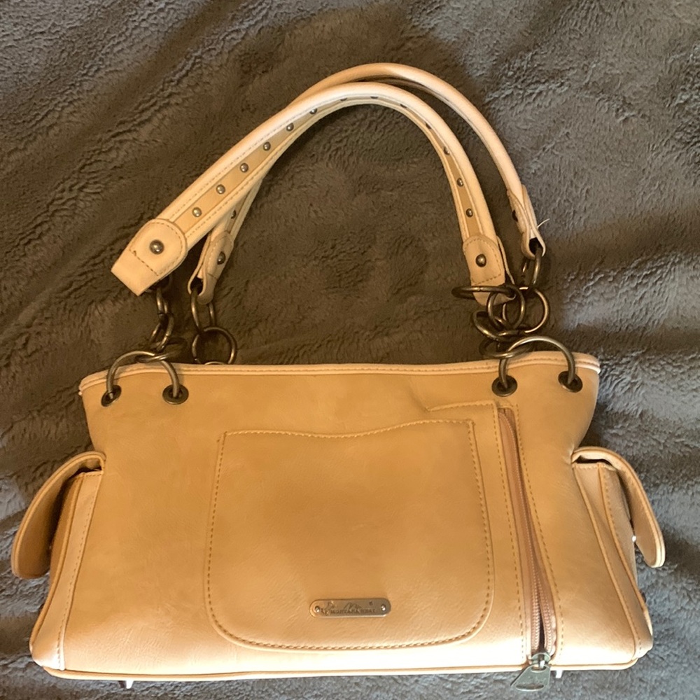 Montana West Handbag. Used a couple times. Excellent condition.